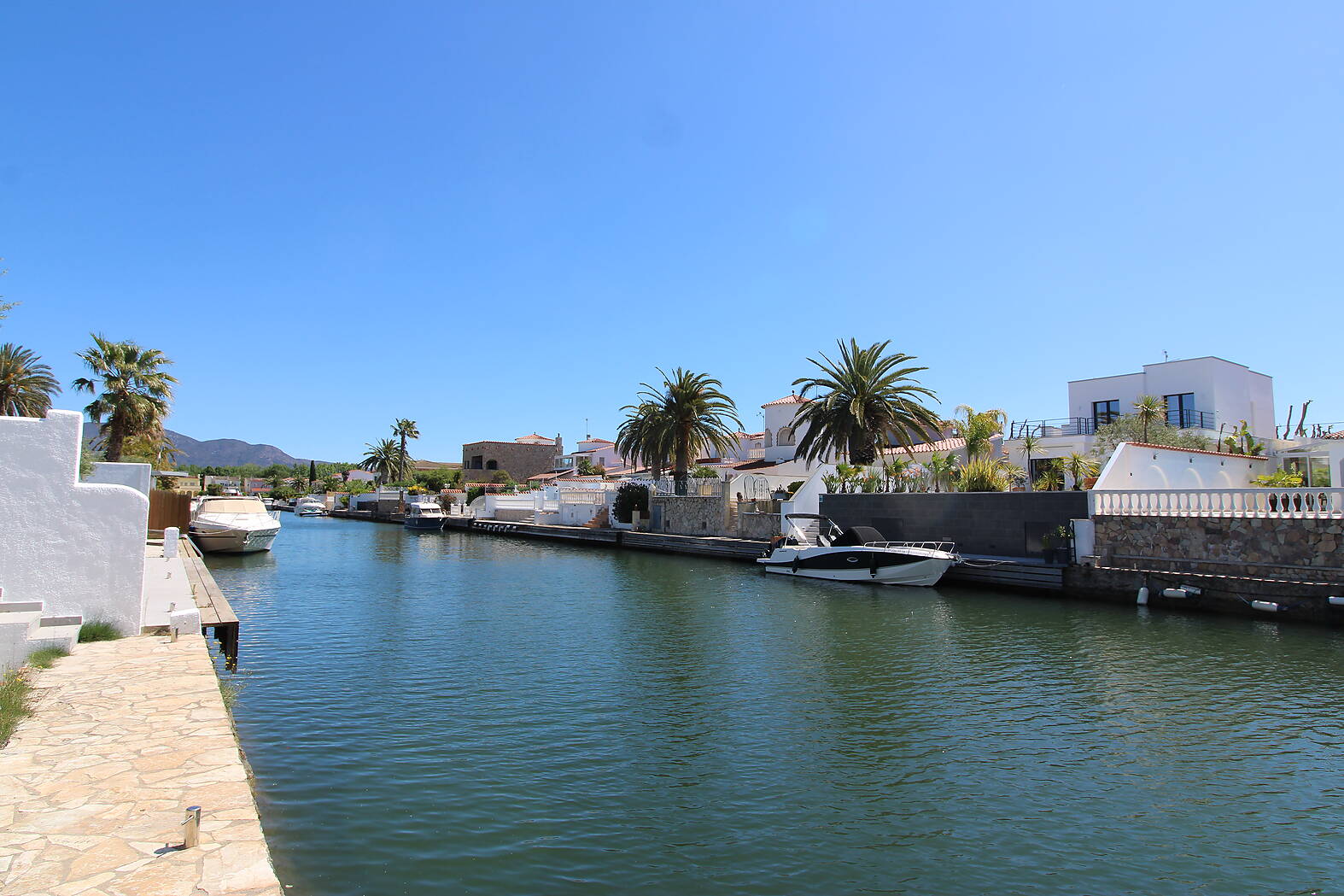 Fantastic newly built villa on a wide canal with mooring for sale in Empuriabrava